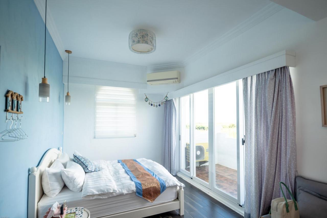 夏日澄藍the Charming Land Apartamento Baisha Exterior foto