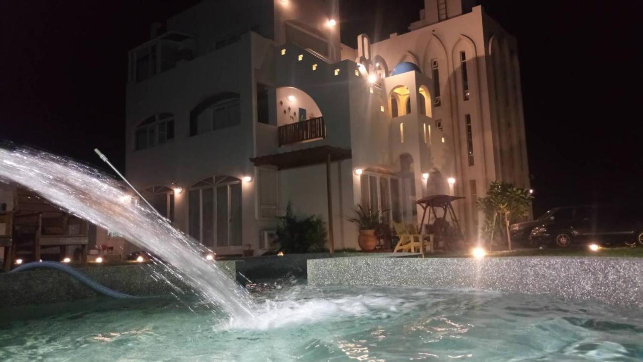 夏日澄藍the Charming Land Apartamento Baisha Exterior foto